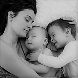 mother-napping-with-sons_700x700_Getty-142638862
